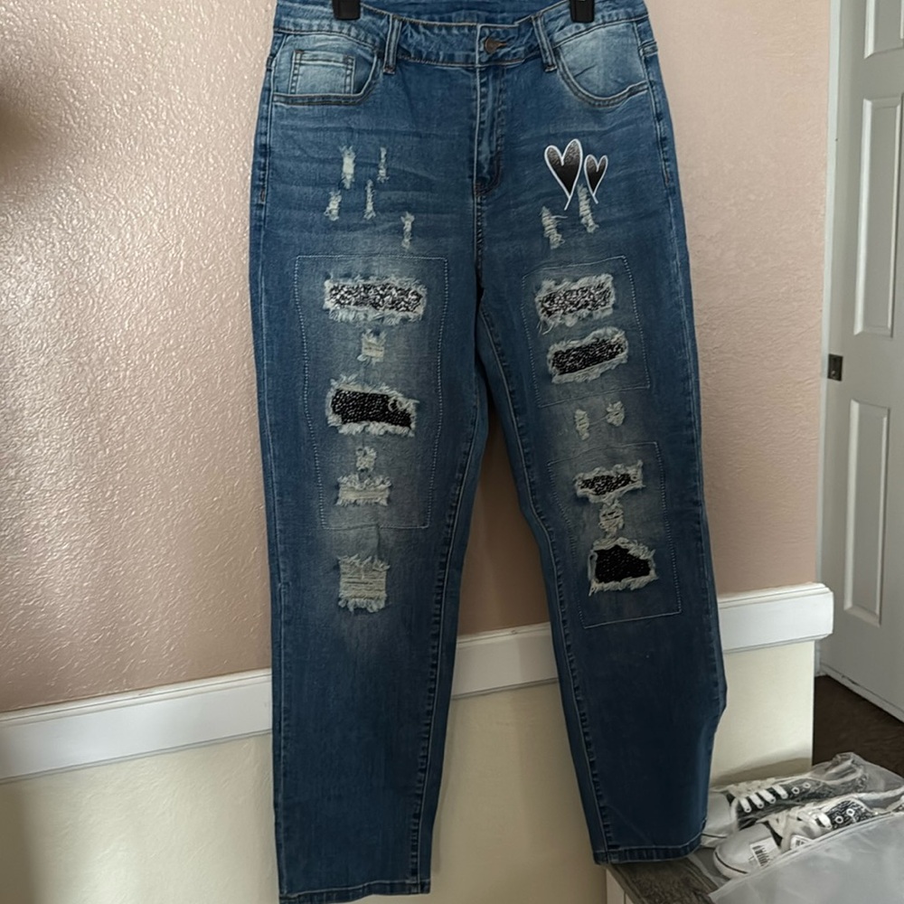 Brand new women’s size 12 stretch strait leg jeans with hearts Valentine’s Day